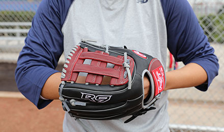 Shop Baseball - Person shoves hand into Mit